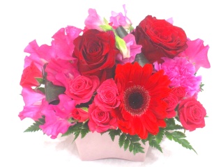 春のお花と赤バラとガーベラ主体のアレンジメント